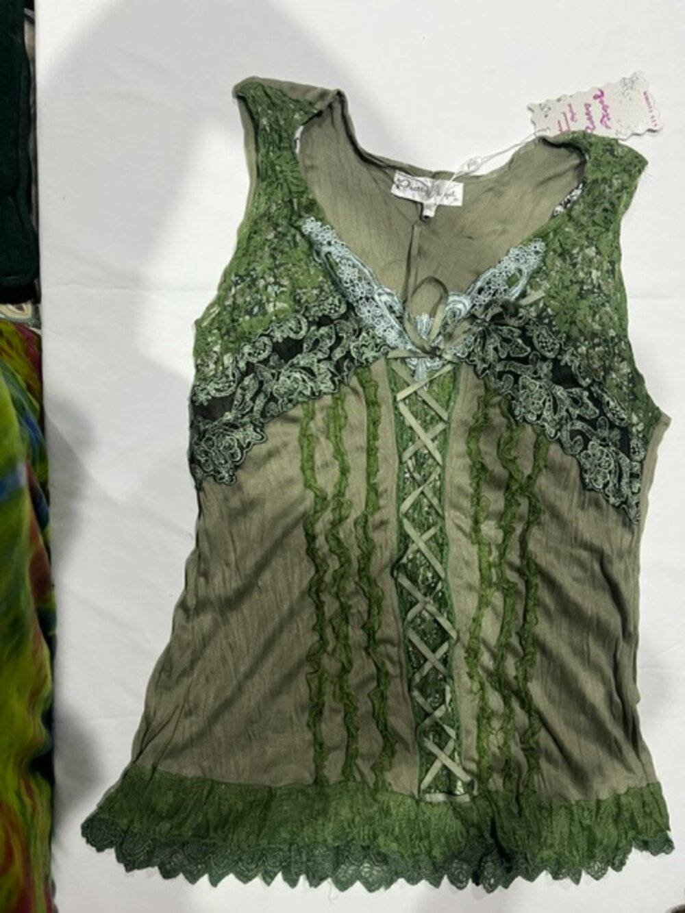 Pretty Angel new with tag green top with aqua accent